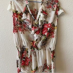 Flutter sleeveless top with elastic waist